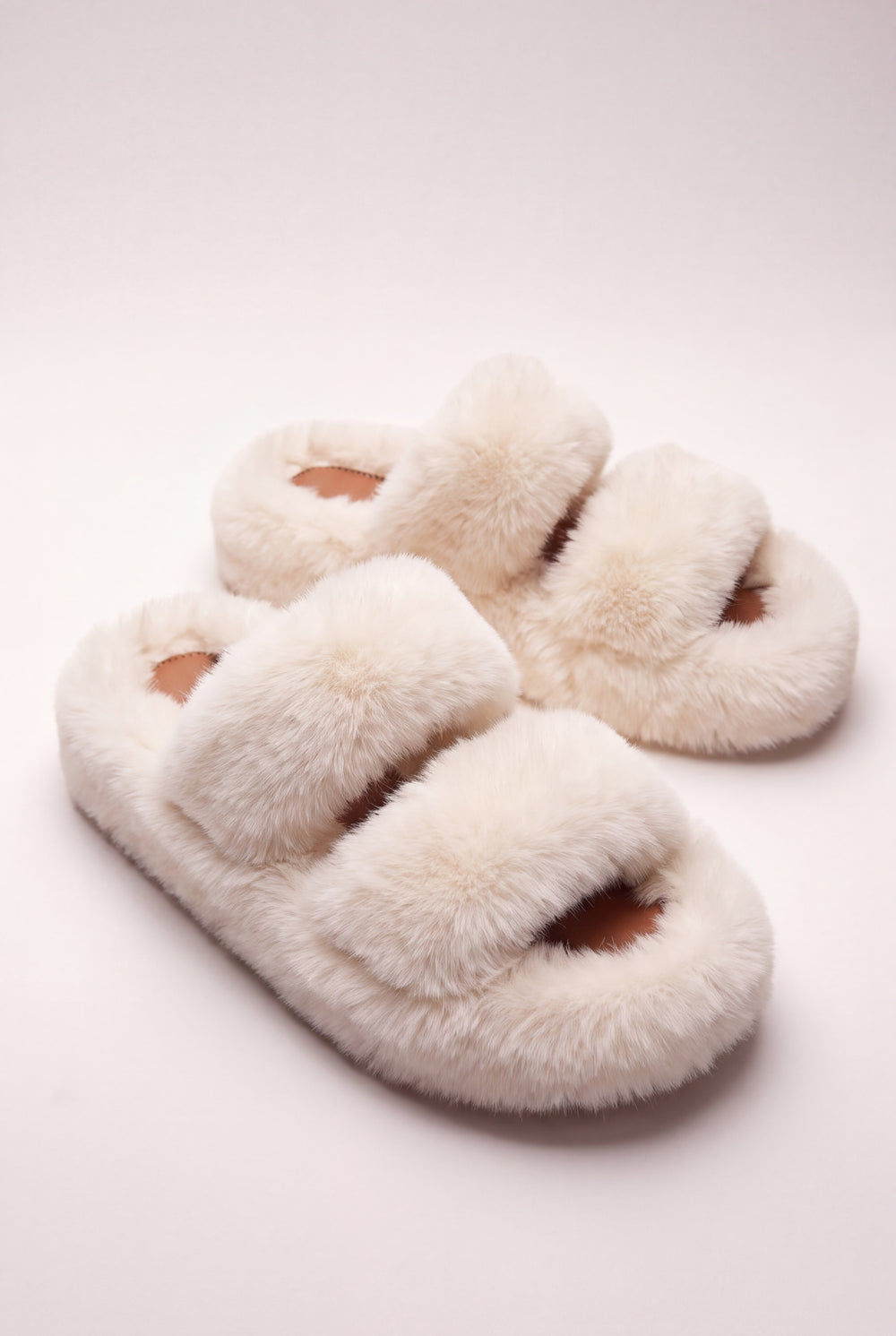The Fluffy White Slippers